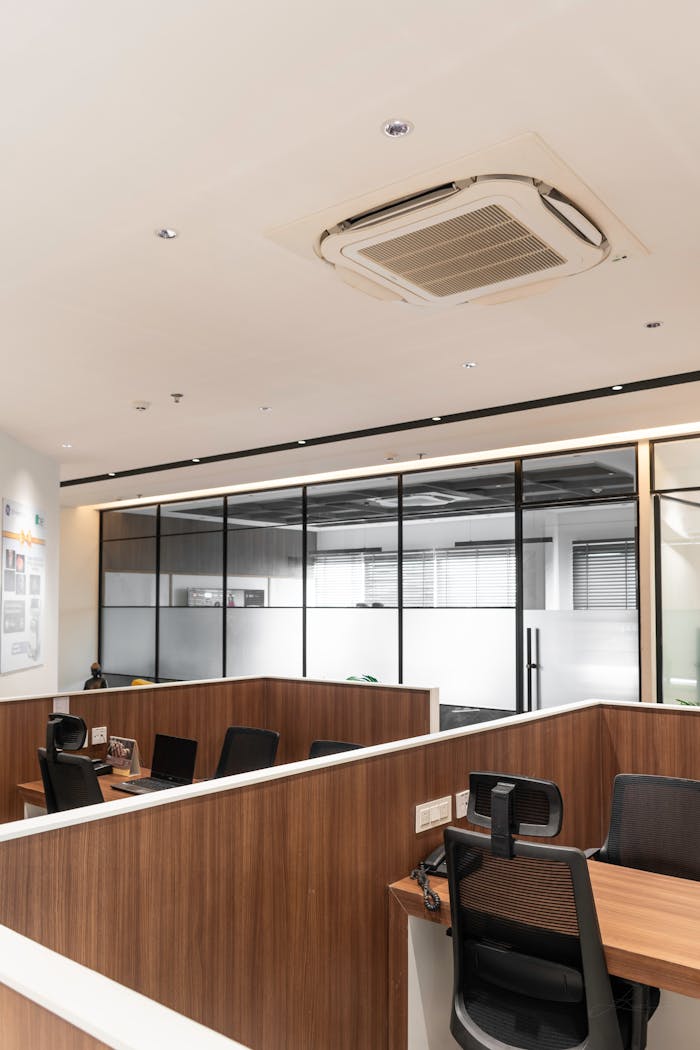 Sleek and contemporary office space in Mohali, Punjab, India showcasing cubicles and minimalist design.